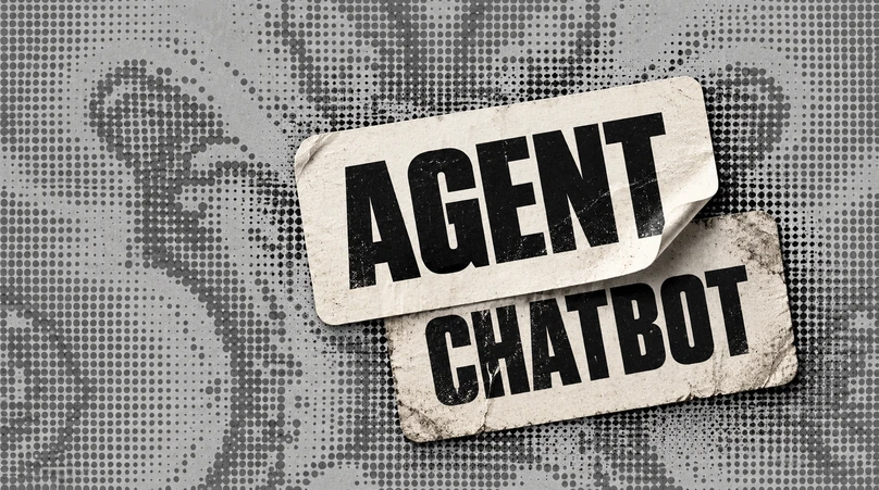 A cream AGENT label peels back over an older CHATBOT label on a grey concrete field of halftone dots